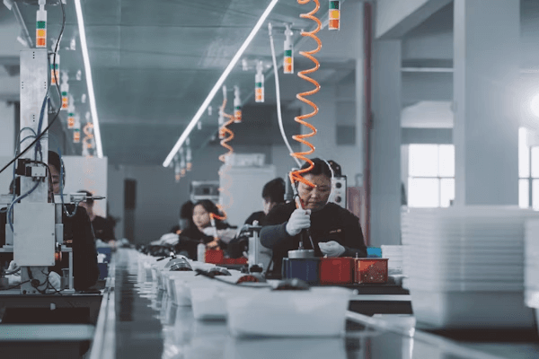 Production line assembling moulded rubber components